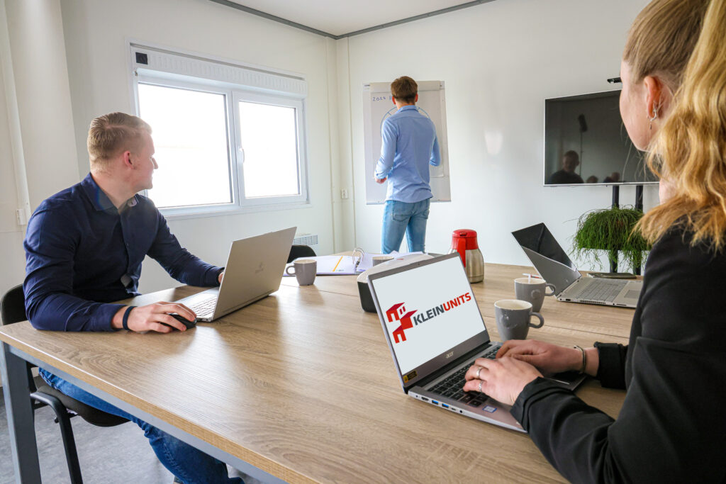 Teamvergadering in kantoorunit